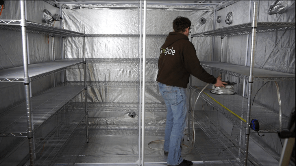 Setting up a large mushroom grow tent.