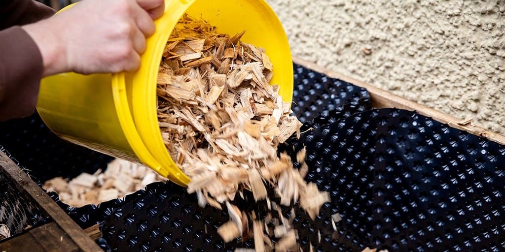 Start Layering Your Bed With Wood Chips and Mushroom Spawn