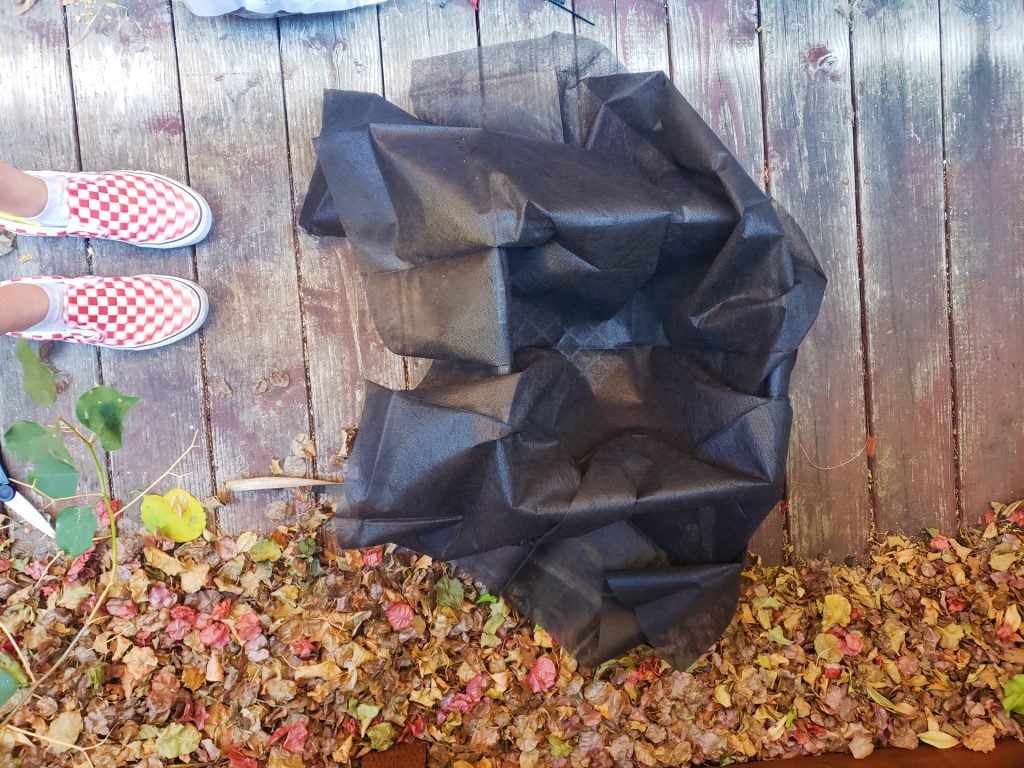 Milk crate with landscape fabric liner