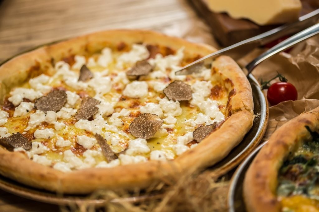 Pizza with Italian black truffles