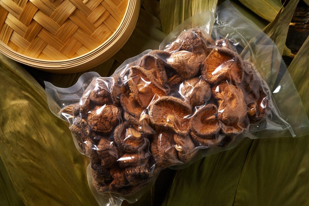 Dried shiitake mushrooms vacuum packed and ready to sell.