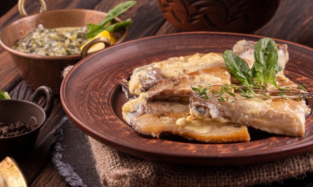 Oyster mushroom steaks in a cream sauce.