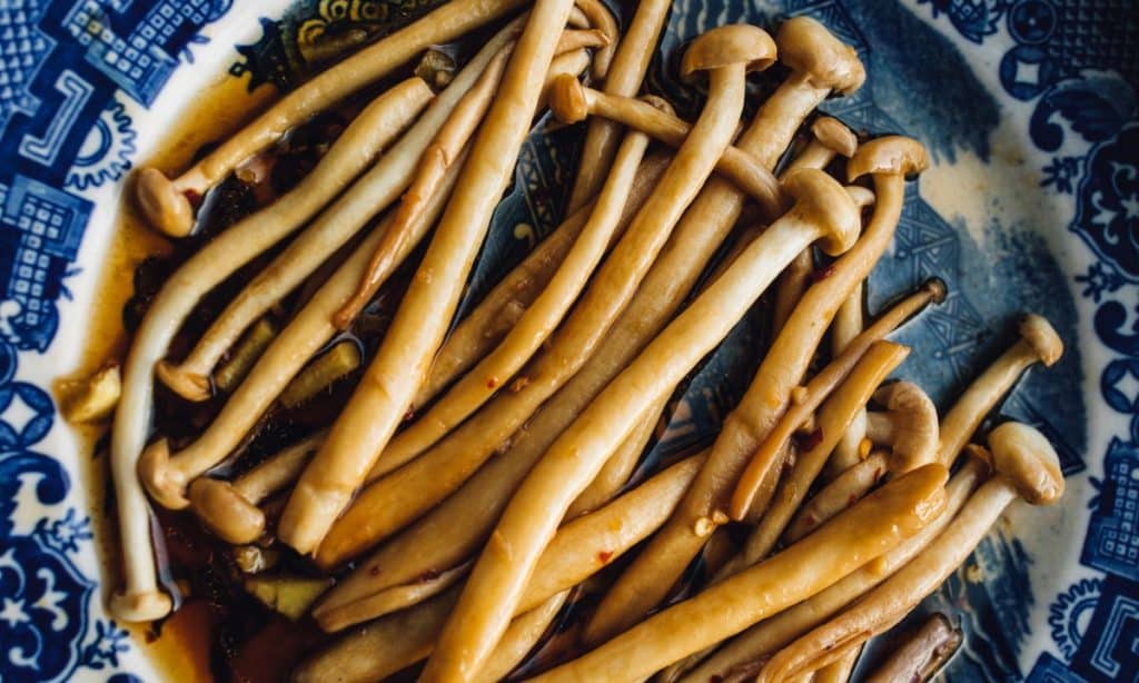 Sauteed enoki mushrooms in soy sauce