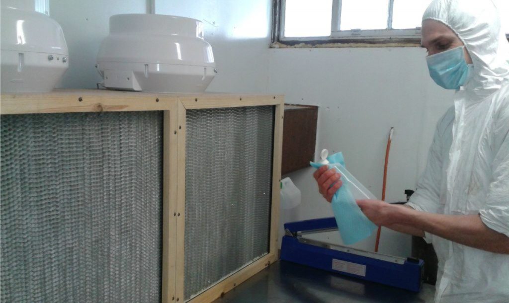 Working in front of a laminar flow hood